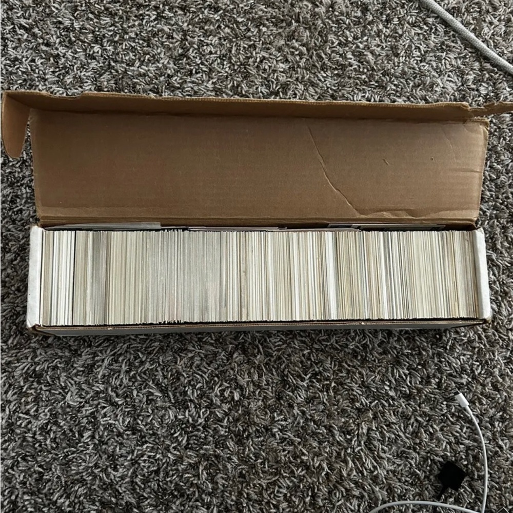 Old baseball, basketball, and football cards lot